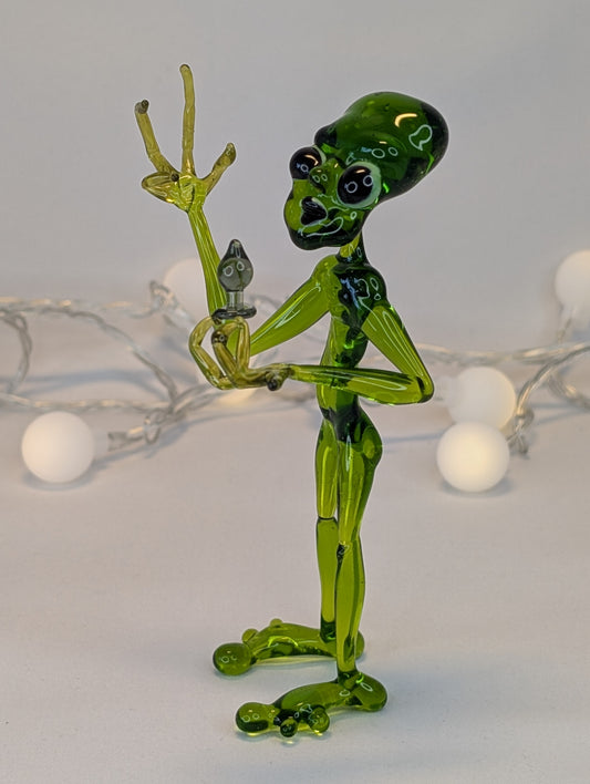 An alien with a happiness device.