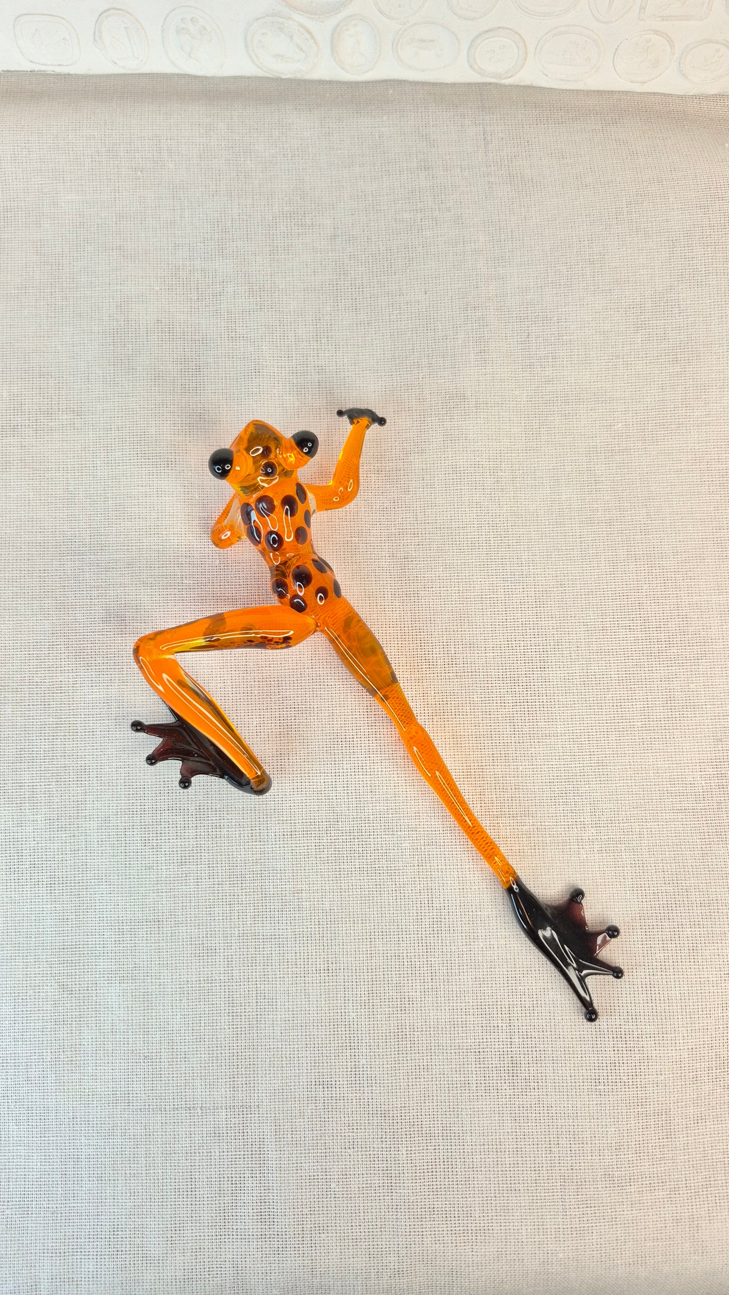 Orange creeping frog