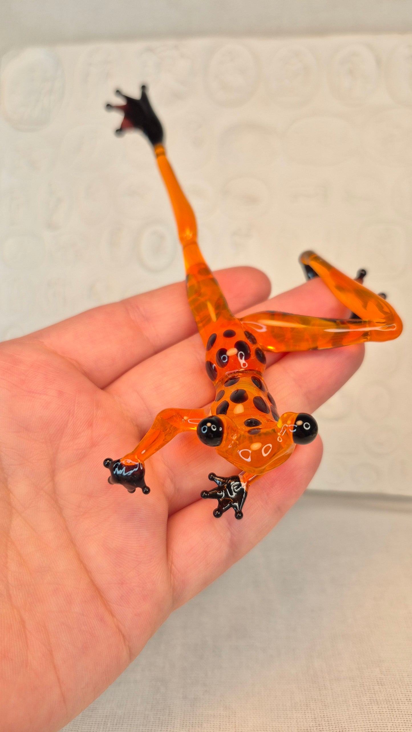 Orange creeping frog