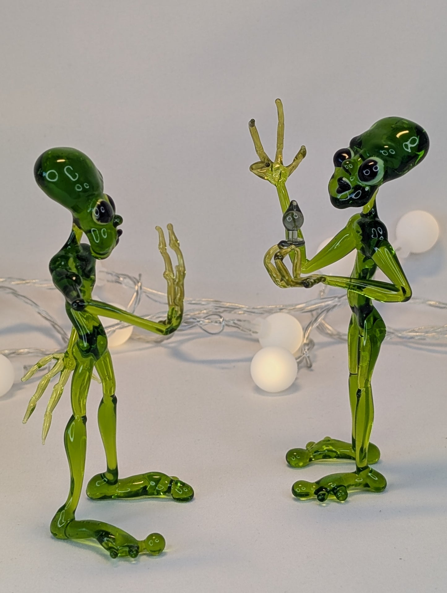 An alien with a happiness device.